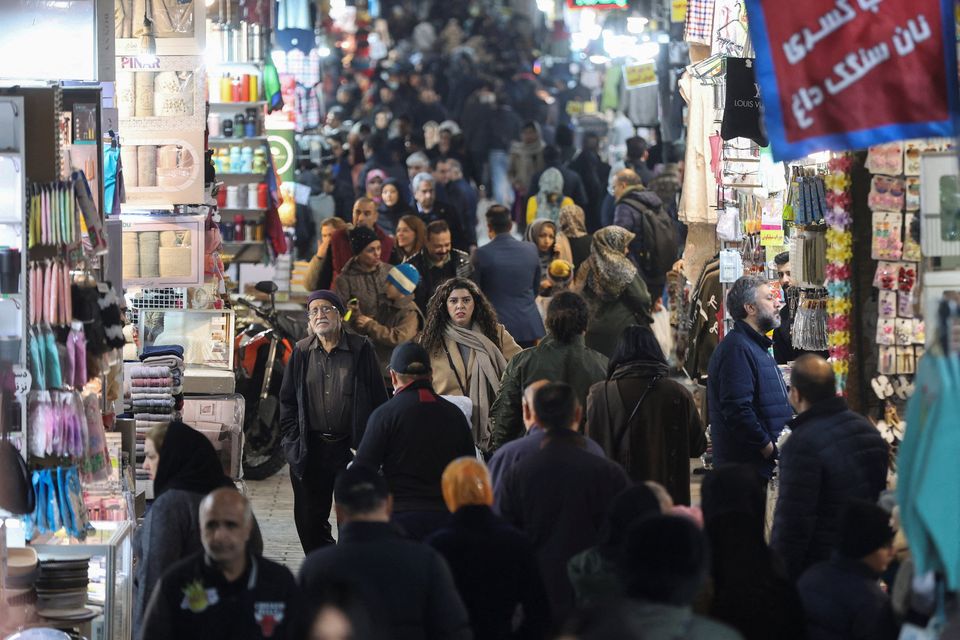 People in Tehran Grand Bazaar yesterday. Protests have reportedly abated since Monday. Photo: Reuters